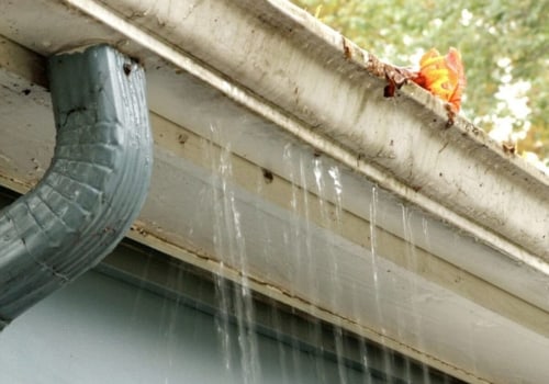 How to Inspect Gutters and Downspouts for Clogs and Damage